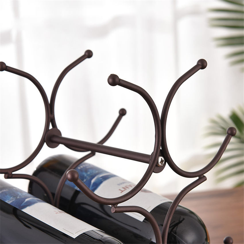 Iron six bottle wine rack